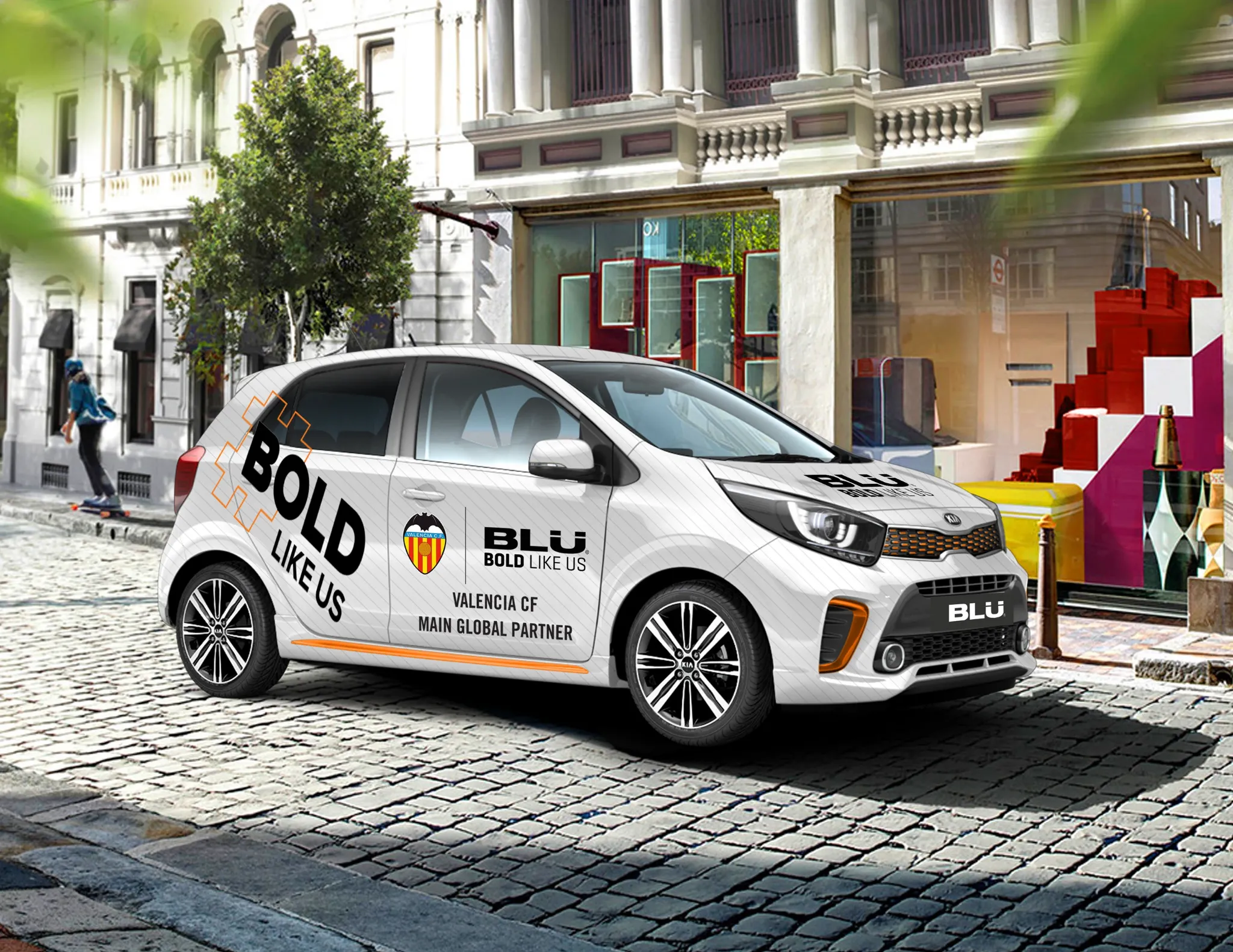Valencia CF branded vehicle photographed on a street, carrying the BLU partnership livery.